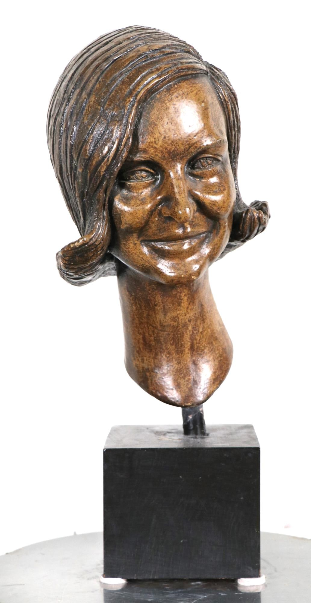 FEMALE BUST SCULPTURE: FEMALE BUST SCULPTURE. Height: 21 in. by Width: 9 in. by Depth: 10 in
