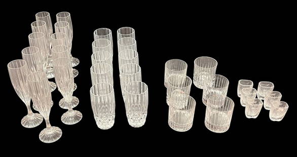 SET OF GLASSWARE: SET OF GLASSWARE INCLUDES 11 CHAMPAGNE GLASSES, 10 GLASSES, 6 WHISKEY GLASSES, 6 MATCH GLASSES Height: 6 in. by Width: 2.5 in. by Depth: 2.5