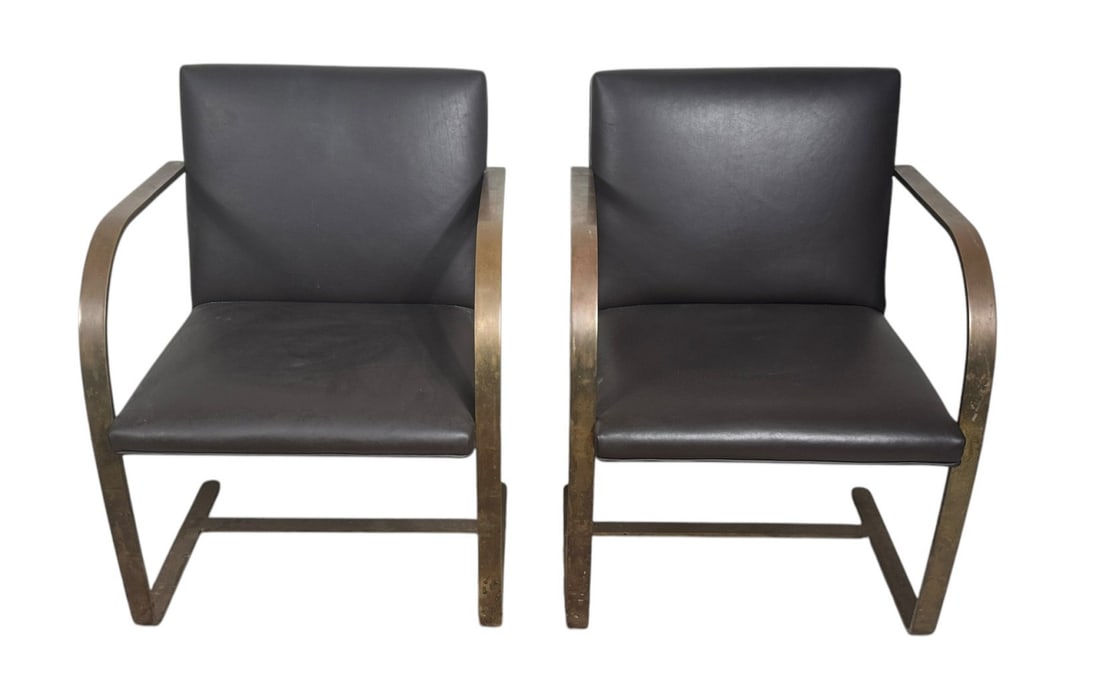 PAIR MIES VAN DER ROHE BY KNOLL LEATHER ARMCHAIRS: PAIR OF MIES VAN DER ROHE BY KNOLL LEATHER ARMCHAIRS. Height: 31 in. by Width: 23 in. by Depth: 21 in.