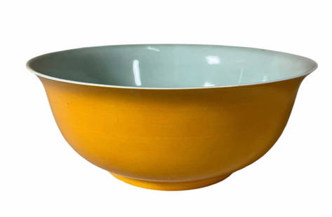 CHINESE YELLOW GLAZED PORCELAIN BOWL: CHINESE YELLOW GLAZED PORCELAIN BOWL. Height: 4 in. by Width: 9.8 in.