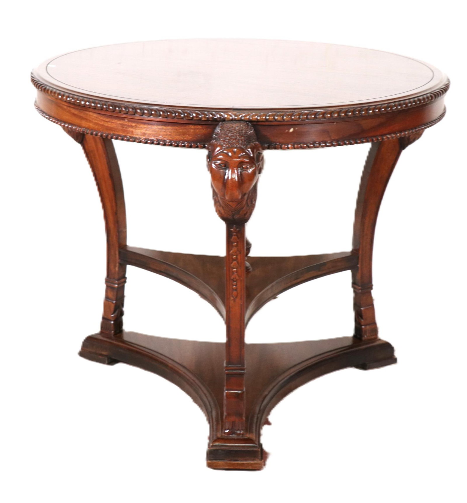 MAHOGANY CENTER TABLE WITH RAMS HEADS: MAHOGANY CENTER TABLE WITH RAMS HEADS. Height: 27 in. by Width: 32 in. by Depth: 32 in.