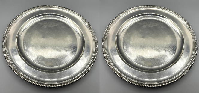 PAIR OF STERLING SILVER GEORGE III PLATES: PAIR OF STERLING SILVER GEORGE III PLATES WITH GADROONED EDGE MADE IN LONDON 1793-1794.