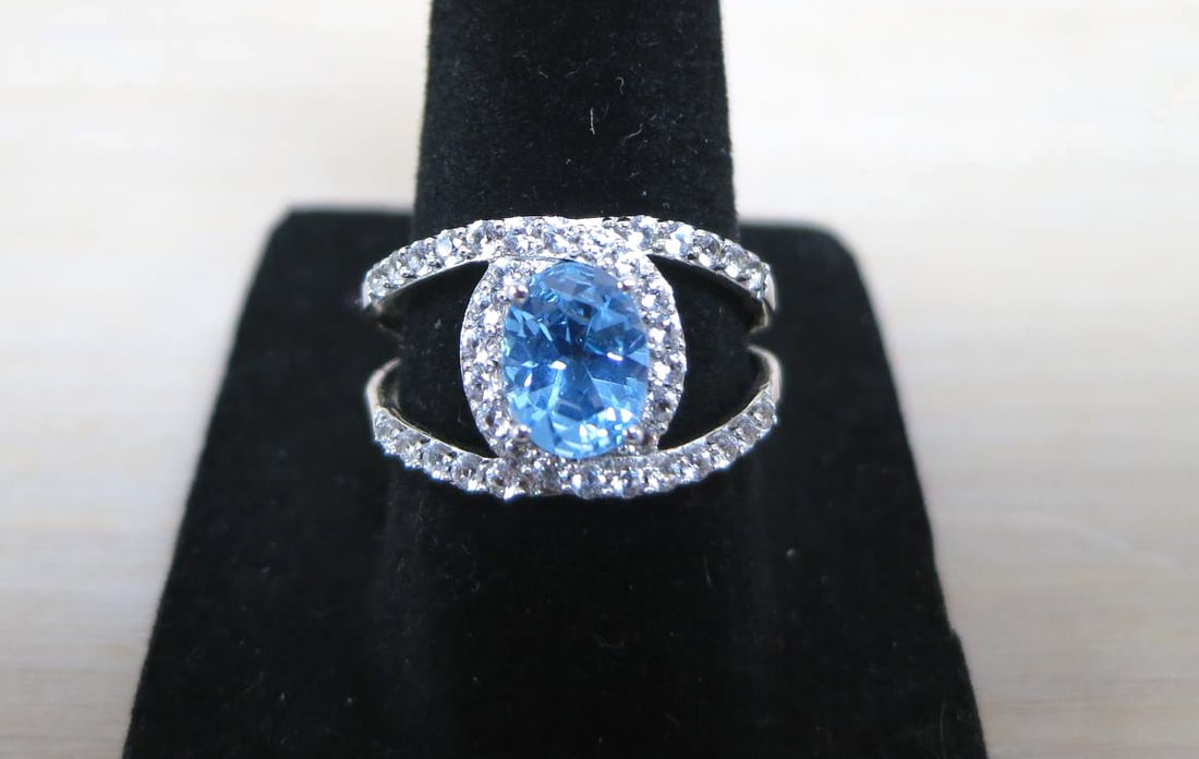 BLUE TOPAZ STERLING SILVER RING: BLUE TOPAZ STERLING SILVER RING. SIZE 7.