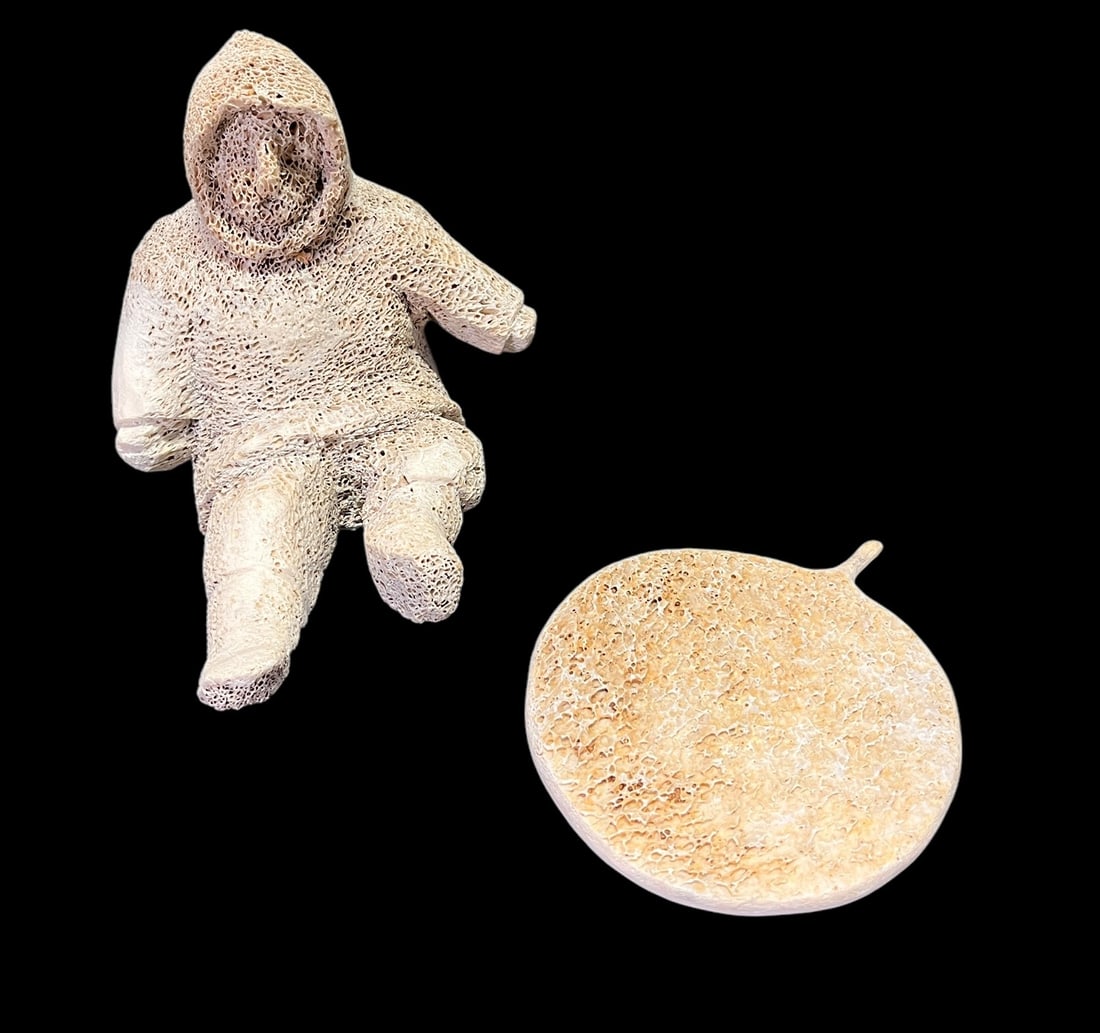 CARVED BONE INUIT & INUIT DRUM: CARVED BONE INUIT & INUIT DRUM. Height: 6 in. by Width: 7 in. by Depth: 7 in.