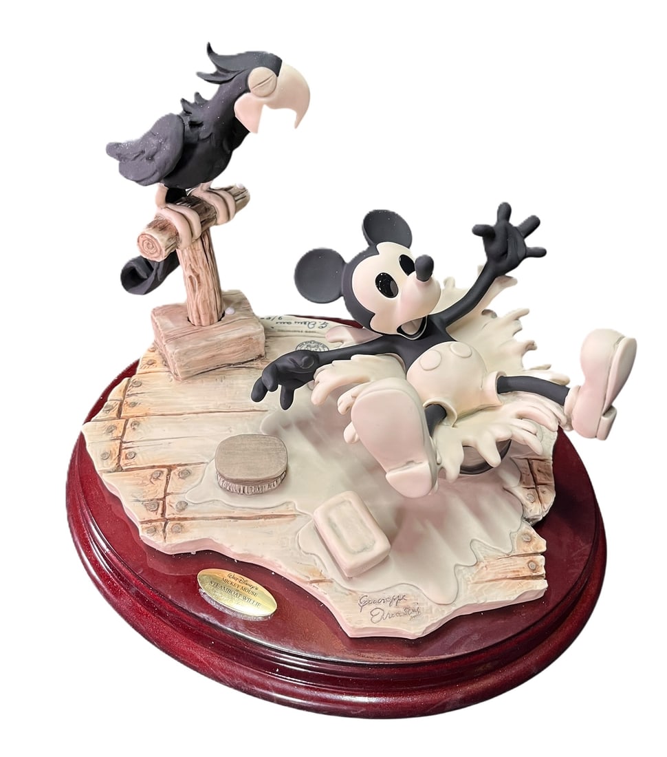 MICKEY MOUSE IN STEAMBOAT WILLIE ART STATUE: MICKEY MOUSE IN STEAMBOAT WILLIE ART STATUE Height: 10 in. by Width: 12.5 in. by Depth: 9.5 in.