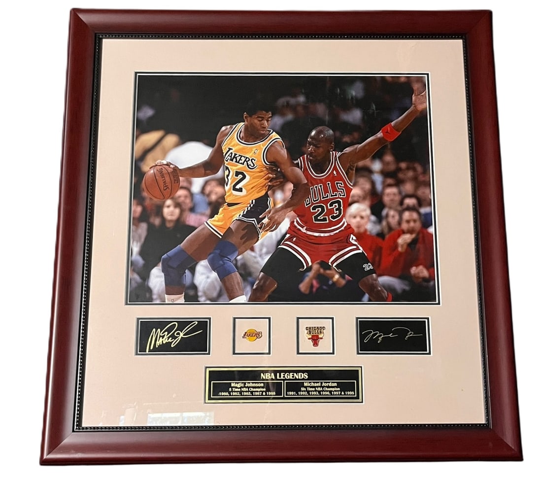 FRAMED MICHAEL JORDAN AND MAGIC JOHNSON SIGNED IN: FRAMED MICHAEL JORDAN AND MAGIC JOHNSON SIGNED IN THE PLATE WS314 Height: 30 in. by Width: 29 in.