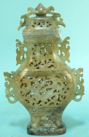 CARVED JADE LIDDED TEMPLE JAR: CARVED JADE LIDDED TEMPLE JAR. Height: 11 in. by Width: 8 in. by Depth: 2 in.