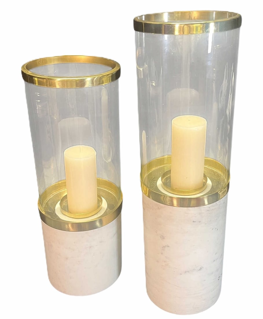 TWO GRADUATED CANDLE HURRICANES: TWO GRADUATED CANDLE HURRICANES ON MARLBE BASES. Height: 26 in. by Width: 8 in. by Depth: 8 in.