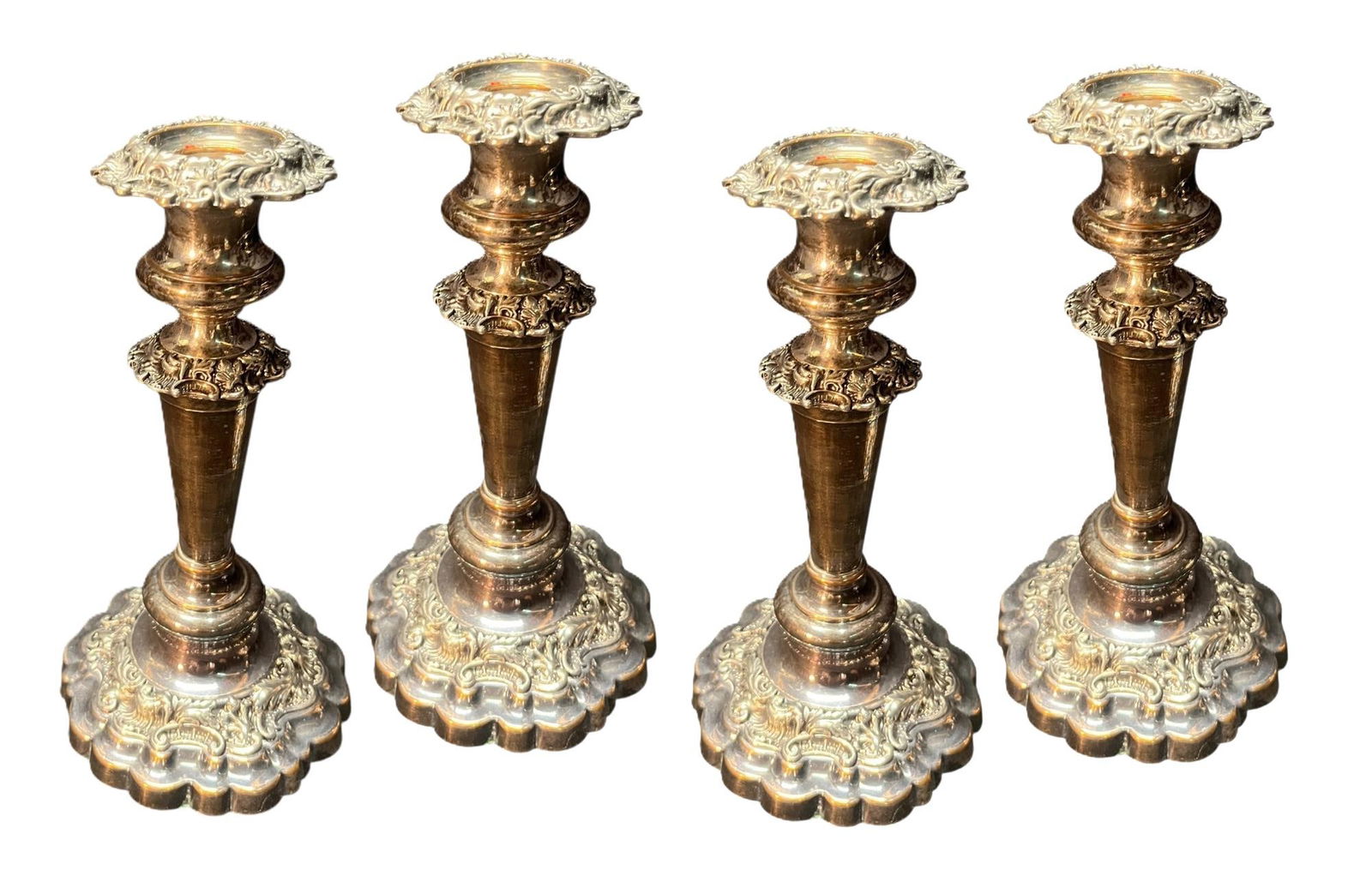 SET OF FOUR BAKER KNAPP & TUBBS CANDLESTICKS: SET OF FOUR BAKER KNAPP & TUBBS SILVER PLATED CANDLESTICKS. Height: 8 in. by Width: 4.5 in. by Depth: 4.5 in.