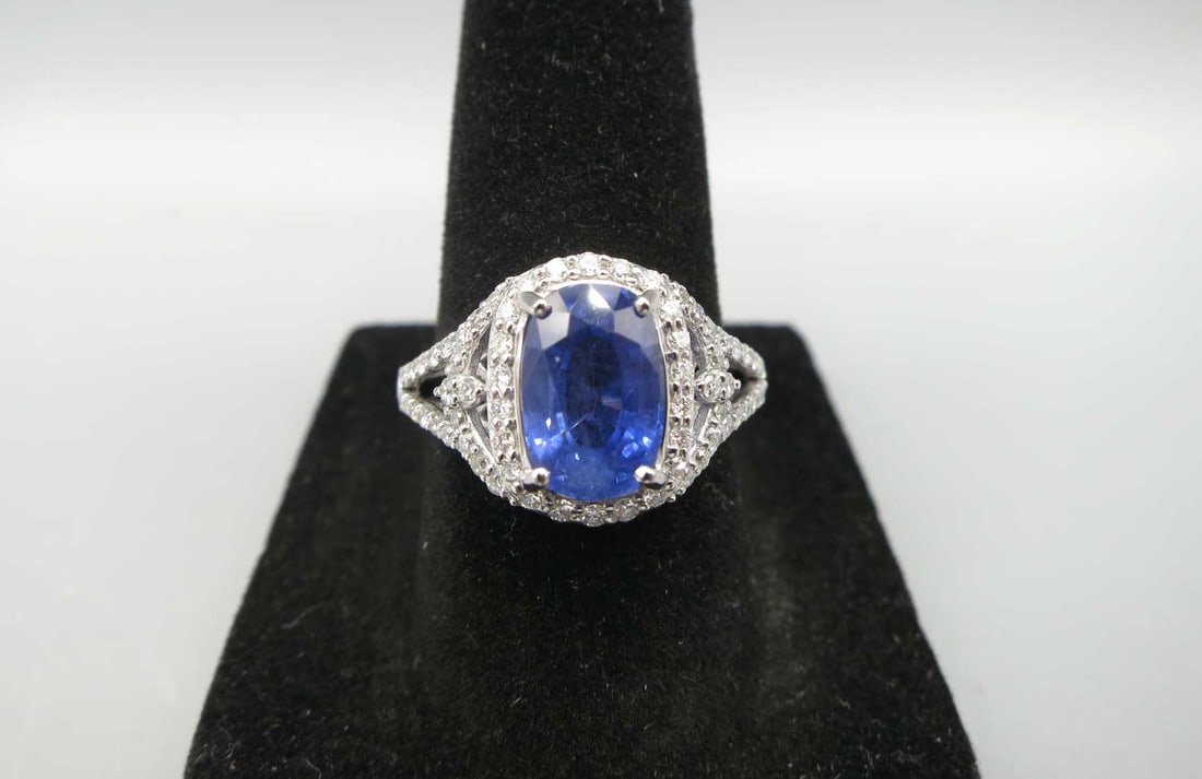 Platinum Sapphire & Diamond ring: Platinum sapphire & diamond ring. Sri Lanka sapphire = 2.91cts, diamonds = 0.47cts. 5.8 grams t.w. Size 7. GGA.