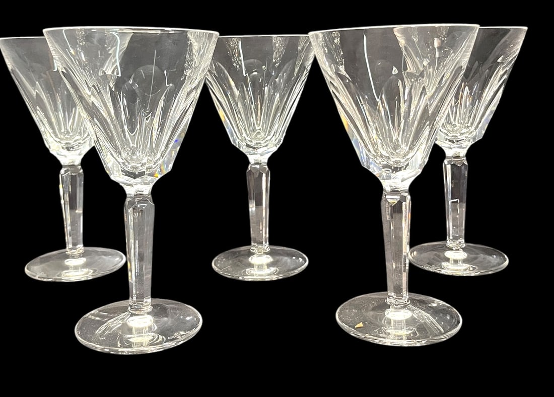 SET OF SEVEN WATERFORD CRYSTAL WINE GOBLETS: SET OF SEVEN WATERFORD CUT CRYSTAL WINE GOBLETS. Height: 7 in. by Width: 4 in. by Depth: 4 in.