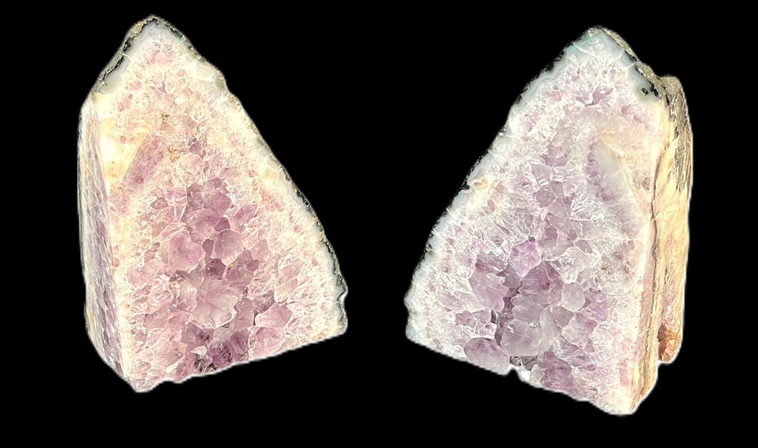 PAIR OF AMETHYST BOOKENDS: PAIR OF NATURAL AMETHYST BOOKENDS. Height: 7.1 in. by Width: 5 in. by Depth: 3 in.