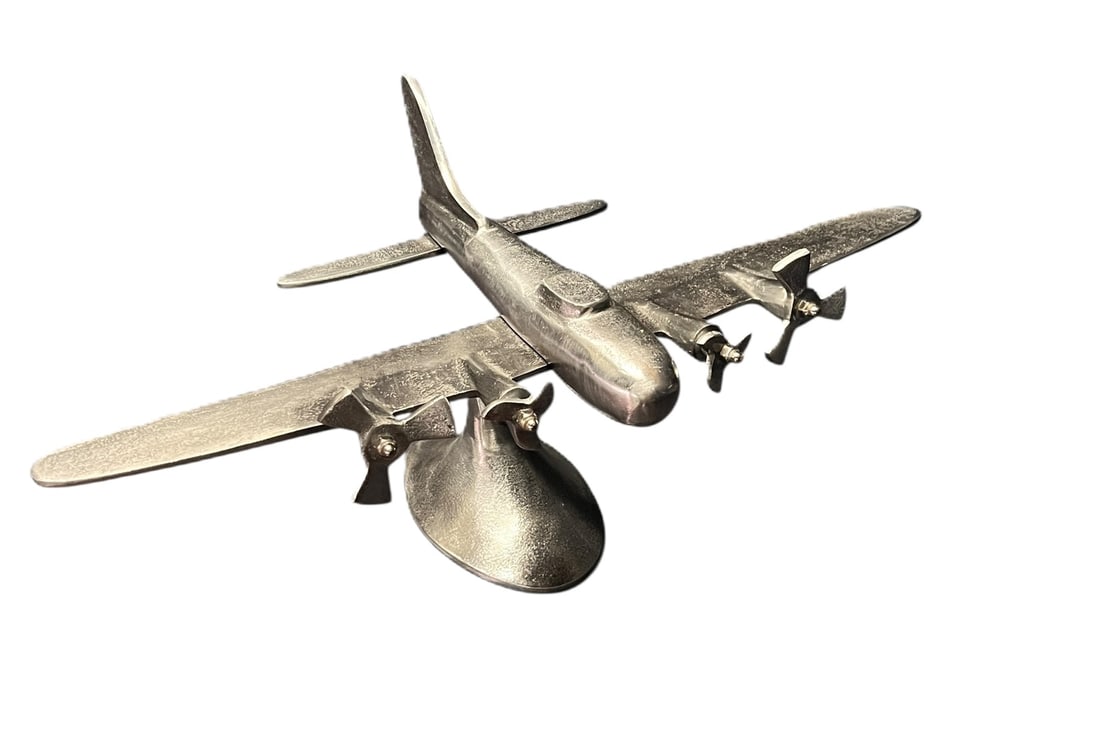 METAL PLANE SCULPTURE: METAL PLANE SCULPTURE. Height: 11 in. by Width: 22 in. by Depth: 12 in.