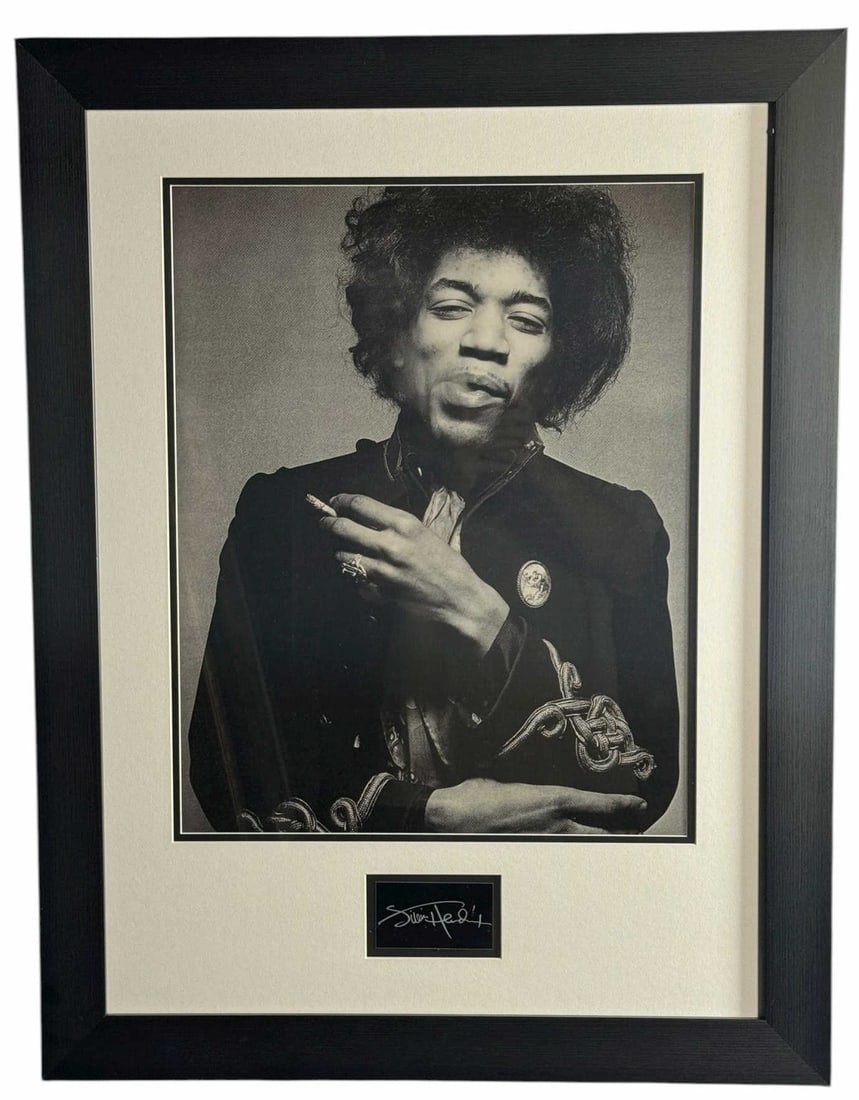 JIMI HENDRIX PHOTOGRAPH SIGNED IN THE PLATE: JIMI HENDRIX PHOTOGRAPH SIGNED IN THE PLATE