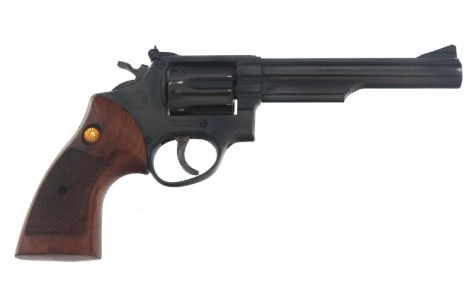 TAURUS MODEL 66 .357 MAGNUM CALIBER DA REVOLVER: TAURUS MODEL 66 .357 MAGNUM CALIBER DA REVOLVER Taurus Model 66 .357 MAG caliber double action revolver. Blued finish. Checkered wood grips with Taurus medallion. Adjustable rear sight. Six shot flute