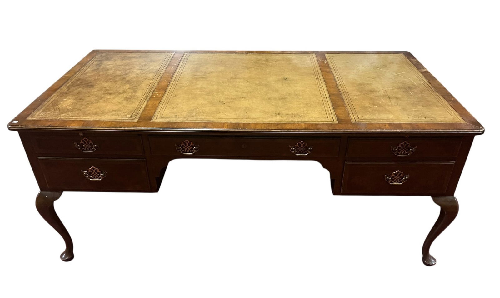 BAKER GEORGIAN STYLE MAHOGANY DESK WITH TOOLED LEATHER TOP: BAKER GEORGIAN STYLE MAHOGANY DESK WITH TOOLED LEATHER TOP. Height: 30 in. by Width: 72 in. by Depth: 34 in.
