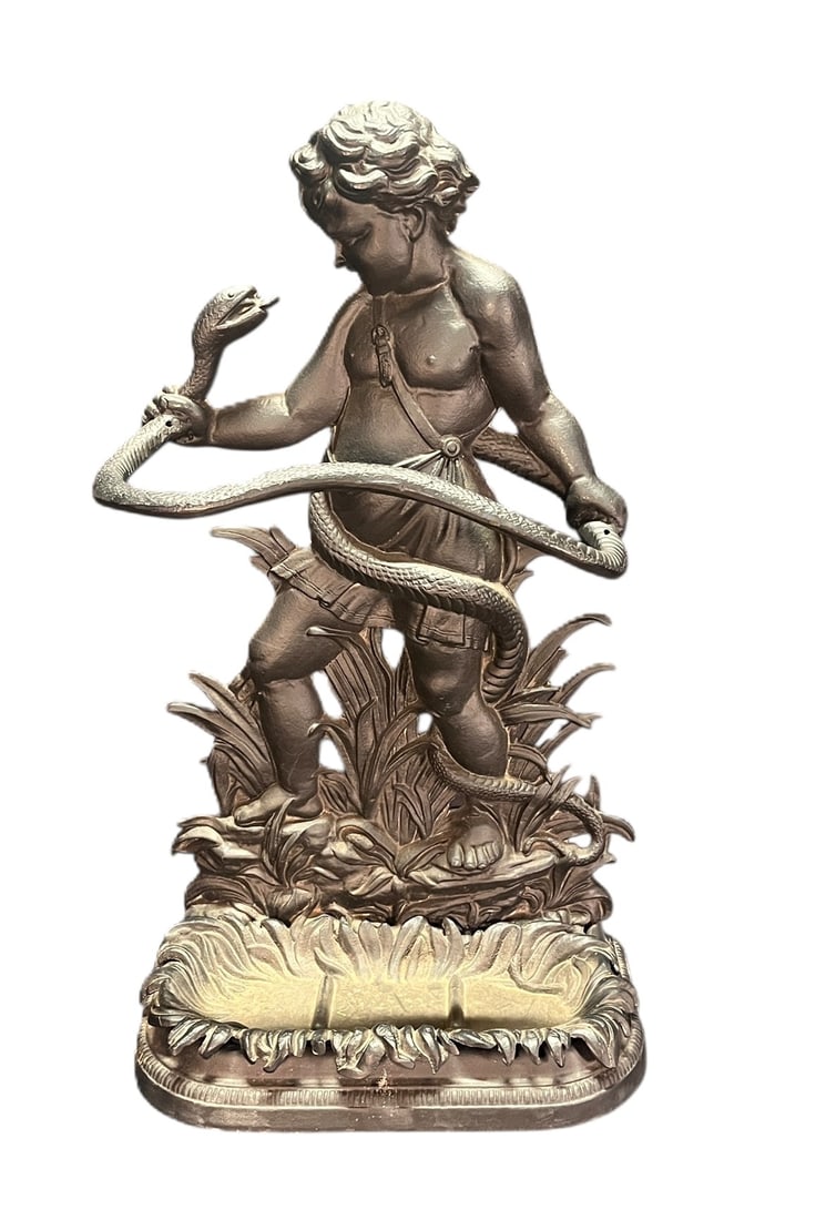 CAST IRON HERCULES AND THE SNAKE CANE STAND: CAST IRON HERCULES AND THE SNAKE CANE STAND. Height: 33 in. by Width: 20 in. by Depth: 10 in.