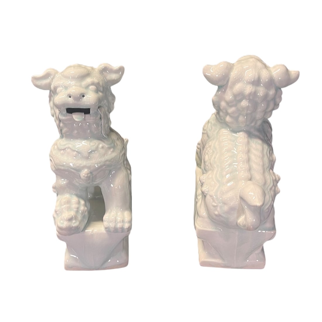 TWO CHINESE PORCELAIN FOO DOGS: TWO CHINESE PORCELAIN FOO DOGS. Height: 15 in. by Width: 5.5 in. by Depth: 12 in.