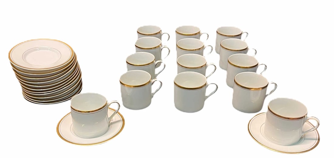 14 FITZ AND FLOYD COFFEE CUPS AND SAUCERS: 14 FITZ AND FLOYD COFFEE CUPS AND SAUCERS. Height: 2.3 in. by Width: 3 in. by Depth: 3 in.