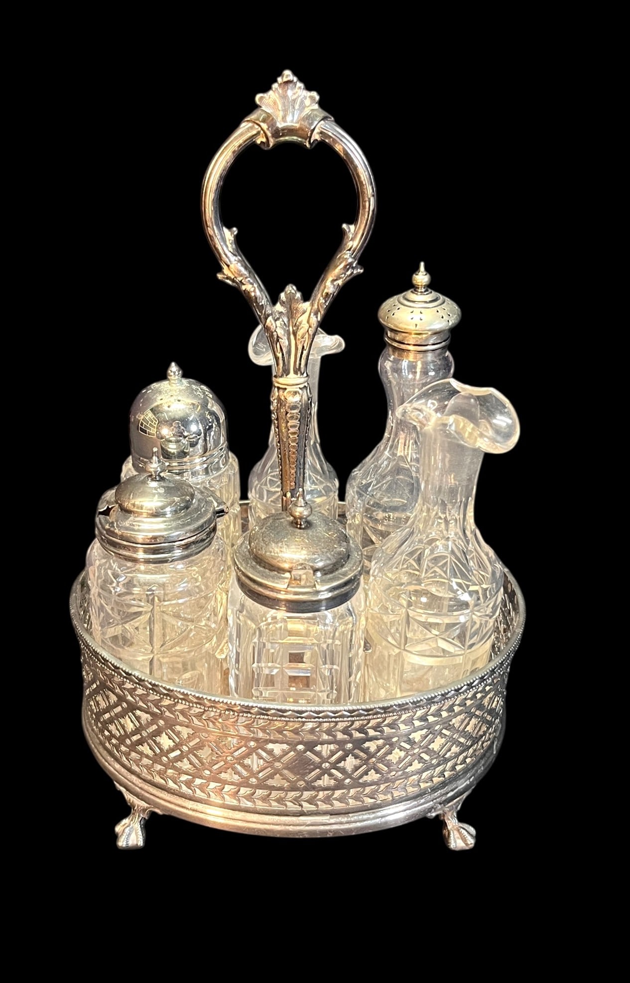 VINTAGE SILVERPLATE AND CRYSTAL CRUET SET: VINTAGE SILVERPLATE AND CRYSTAL CRUET SET. Height: 11 in. by Width: 7.5 in. by Depth: 6 in.