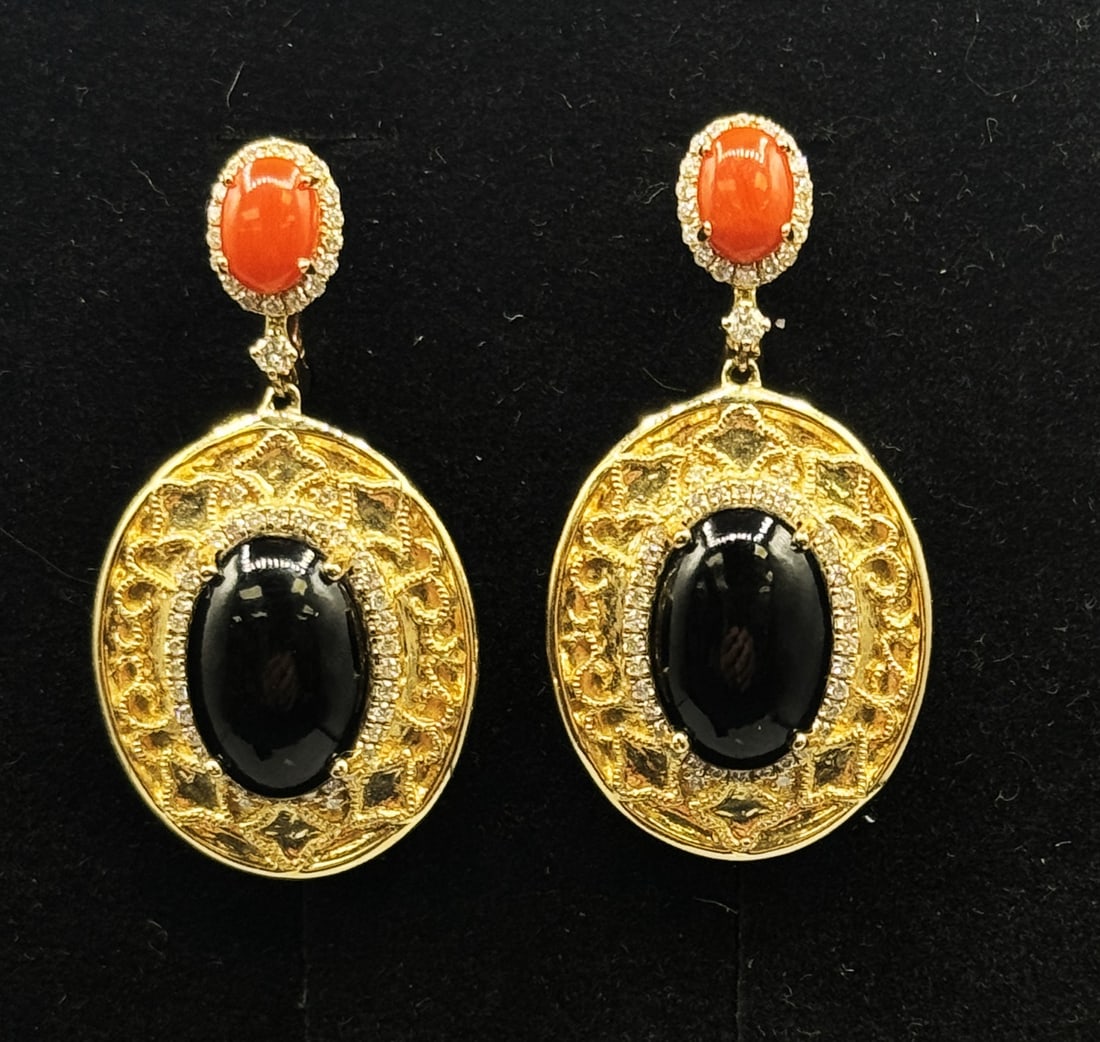 14KY CORAL & DIAMOND EARRINGS: 14KY CORAL & DIAMOND EARRINGS 14KY 12.56 GRAMS. CO 2 5.20 CO 2 1.48 RD 114 0.64 MIN 5.09 E1702429 (92)