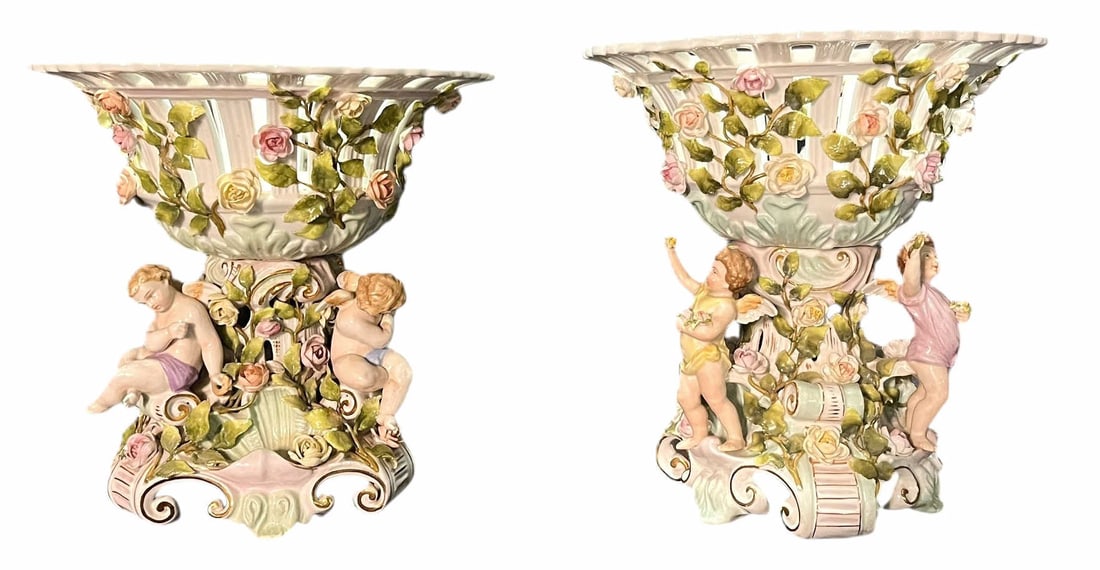 VINTAGE SCHIERHOLZ PORCELAIN CHERUB CENTERPIECES: PAIR OF VINTAGE SCHIERHOLZ PORCELAIN CHERUB CENTERPIECES. Height: 12 in. by Width: 12 in. by Depth: 12 in.