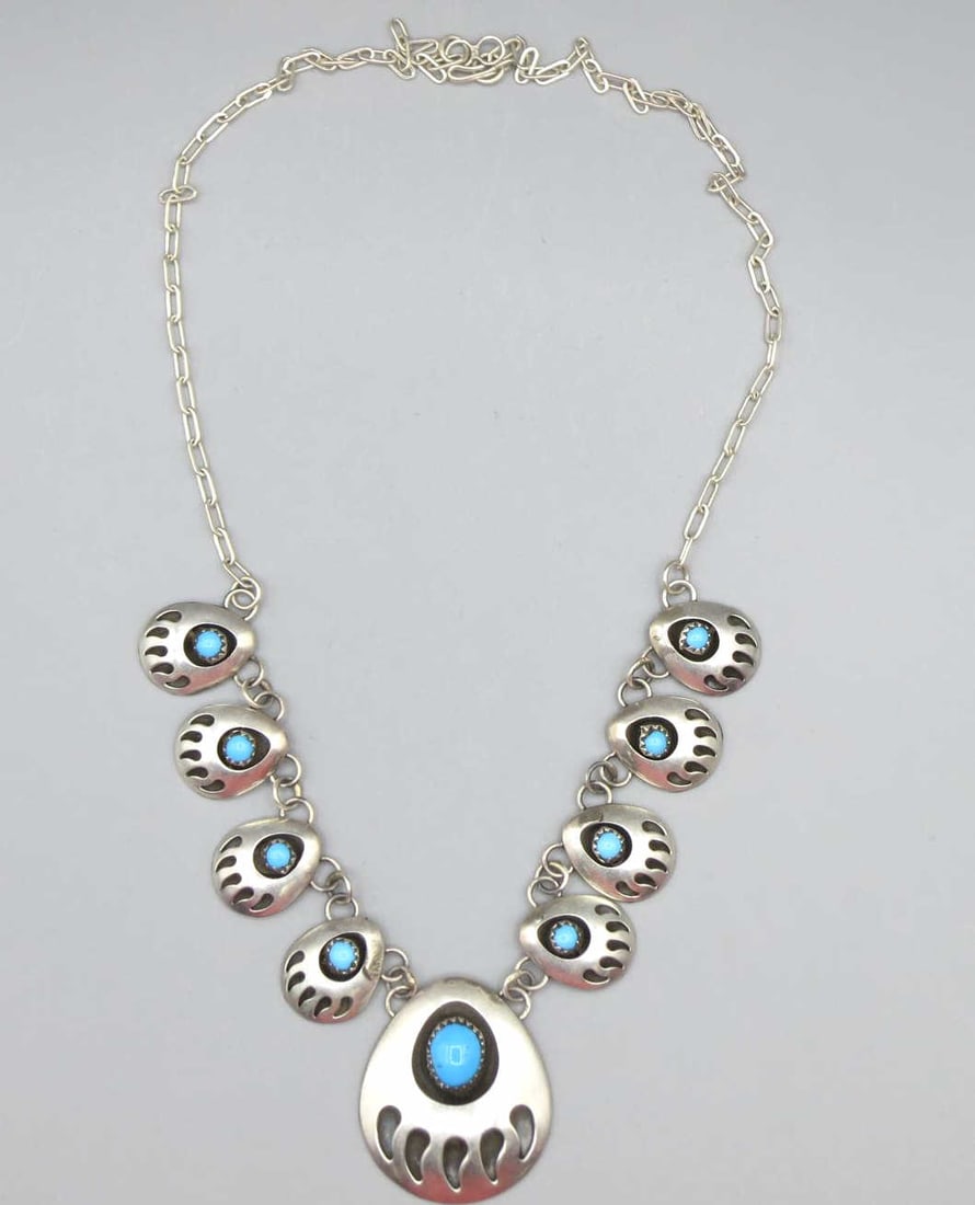 STERLING SILVER TURQUOISE BEAR PAW MOTIF NECKLACE: STERLING SILVER TURQUOISE BEAR PAW MOTIF NECKLACE. 16" T. L.