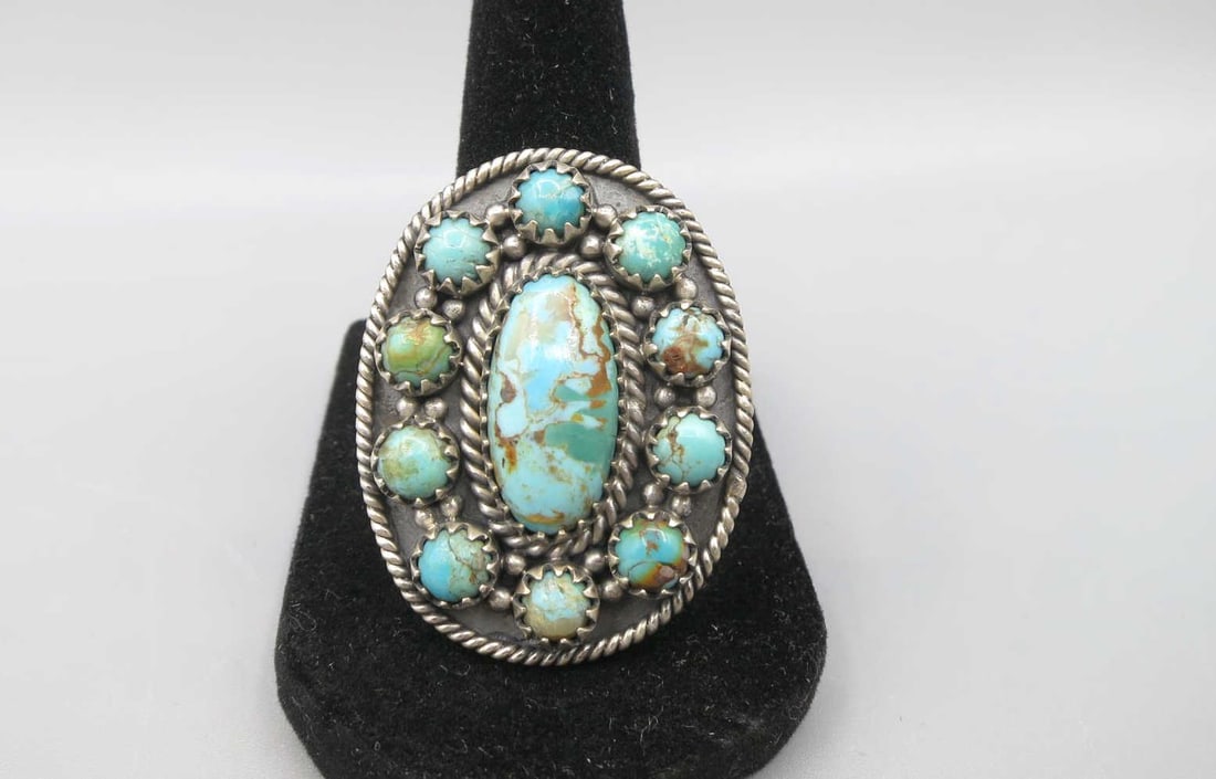 STERLING SILVER TURQUOISE FLOWER RING: STERLING SILVER TURQUOISE FLOWER RING. SIZE 9.