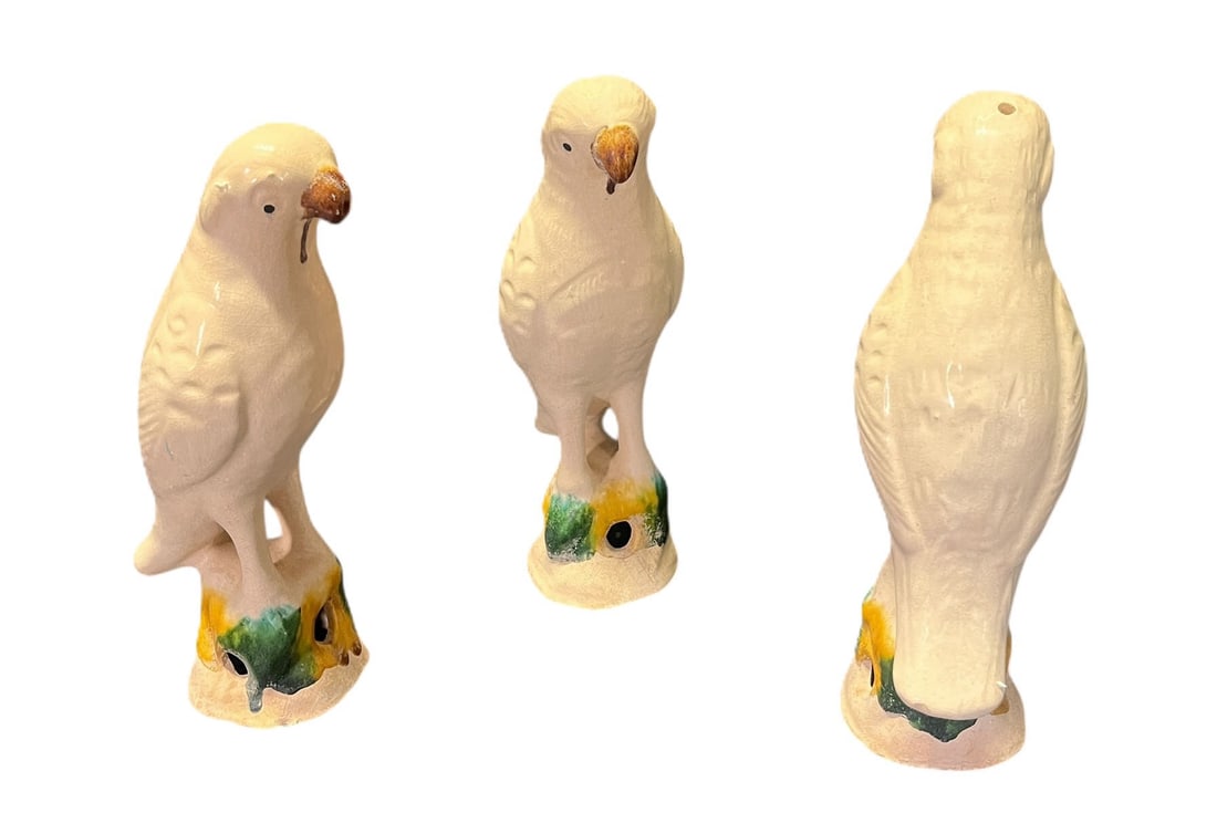 THREE WHITE CERAMIC GLAZED PARROTS: THREE WHITE CERAMIC GLAZED PARROTS. Height: 8 in. by Width: 6.5 in. by Depth: 6.5 in.