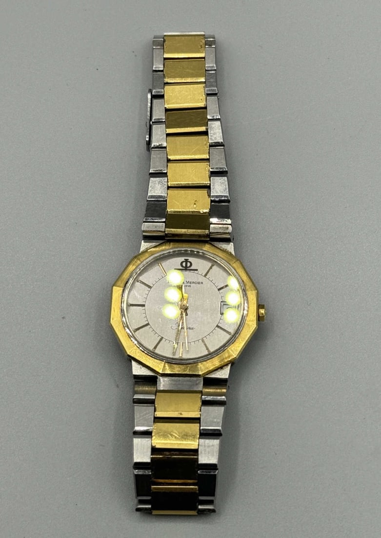 STAINLESS AND GOLD PLATED BAUME & MERCIER WATCH: STAINLESS AND GOLD PLATED BAUME AND MERCIER RIVERIA QUARTZ WATCH WITH DATE MODEL A5222018 SERIAL 1192211.