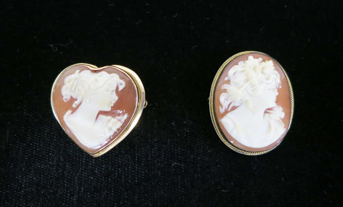 TWO VINTAGE 14KT GOLD CAMEO PENDANTS/BROOCHES: TWO VINTAGE 14KT YELLOW GOLD CAMEO PENDANTS/BROOCHES. Height: 1 & 1 1/8 in. by Width: 1 & 3/4 in. by Depth: 1/4 & 1/4 in.