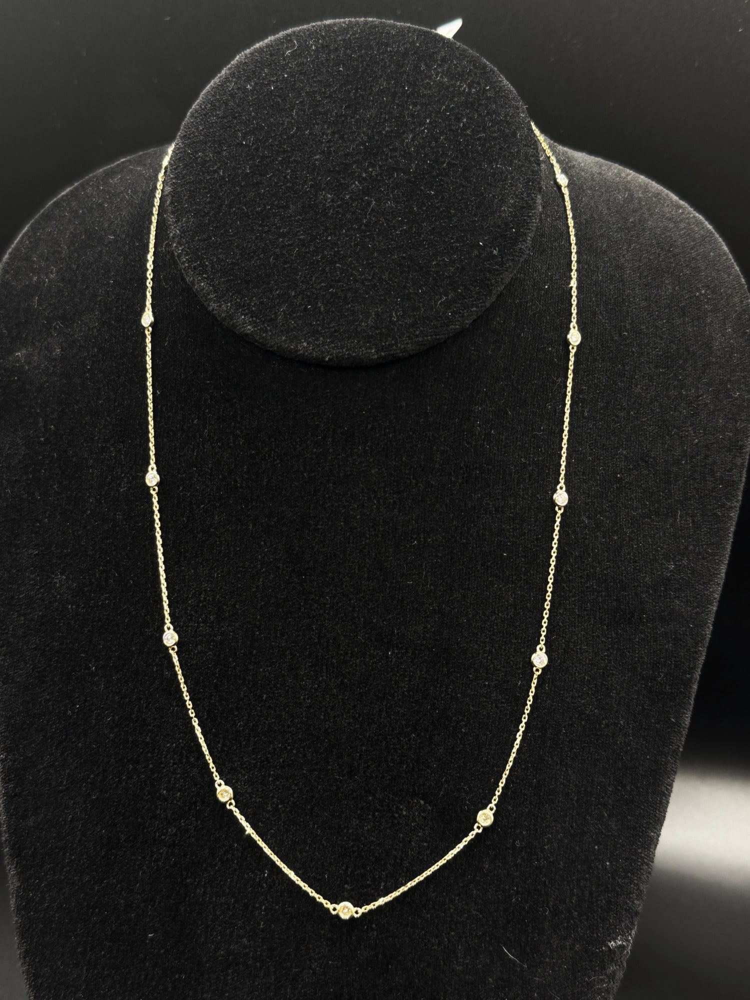 14K YELLOW GOLD DIAMOND NECKLACE: 14K YELLOW GOLD DIAMOND NECKLACE. 14KY 2.45 GM RD 13 0.77 WPK. N2412054 (66)