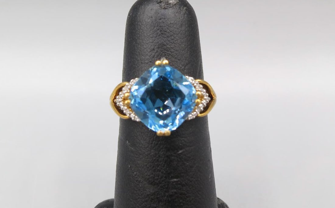 BLUE & WHITE TOPAZ GOLD WASH OVER STERLING RING: BLUE & WHITE TOPAZ GOLD WASH OVER STERLING SILVER SIZE SIX RING.