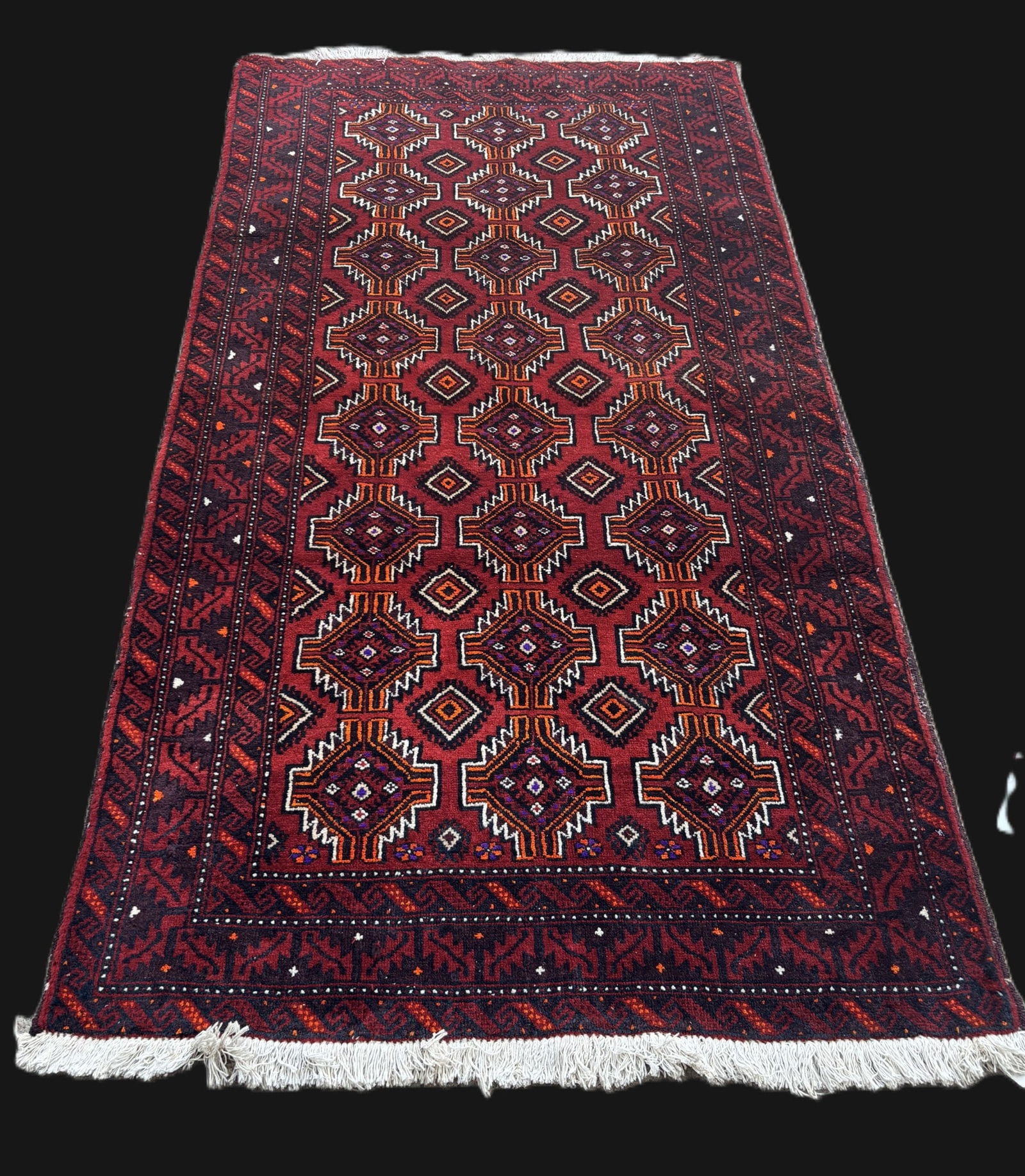 AFGAN BALUCH HAND KNOTTED GEOMETRIC PATTERN RUG: AFGAN BALUCH HAND KNOTTED GEOMETRIC PATTERN RUG. (6) Height: 6 ft. 5 in. by Width: 3 ft. 6.5 in.