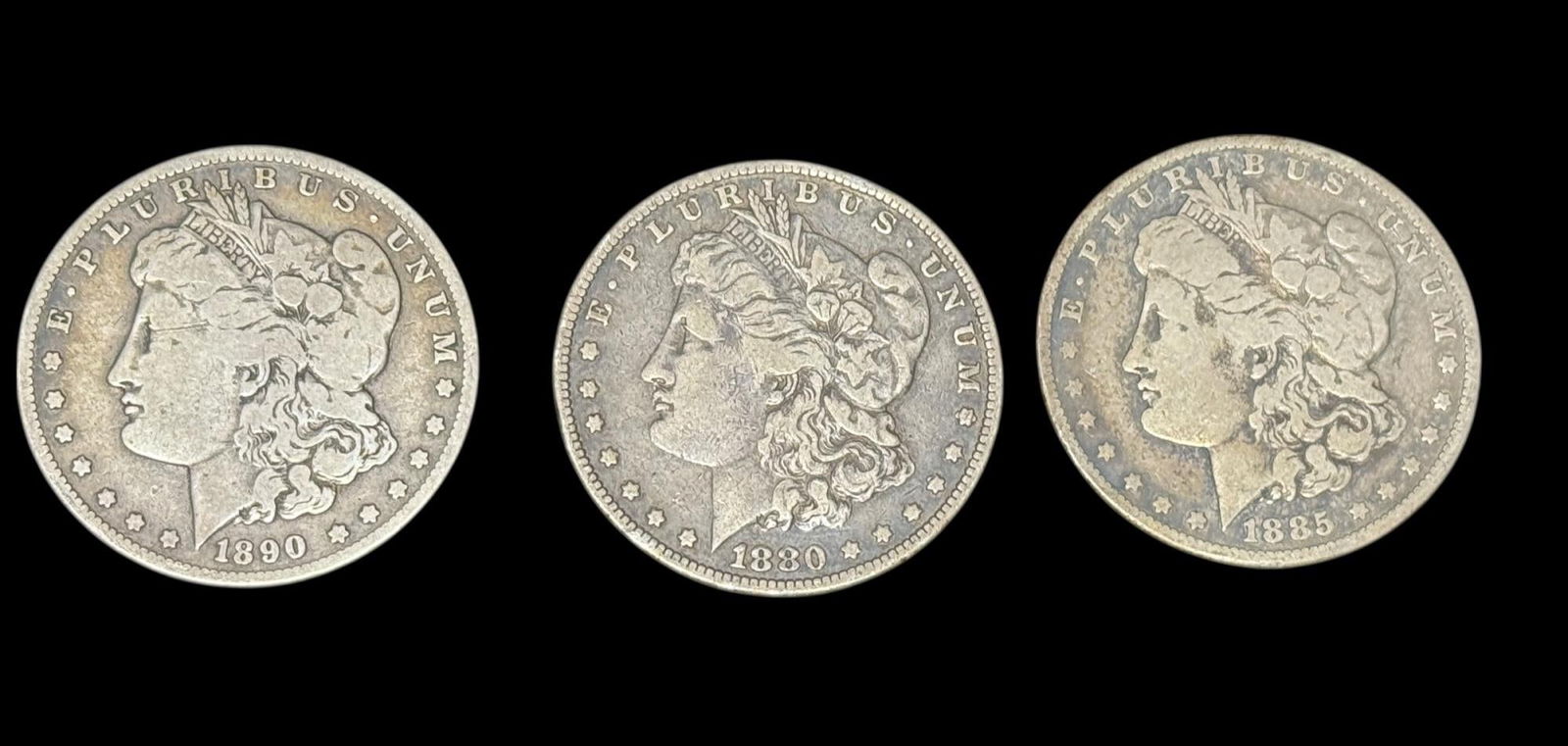 5 ANTIQUE MORGAN SILVER DOLLARS: 5 ANTIQUE MORGAN SILVER DOLLARS. 1887, 1890 1880, 1885, 1884. (3)