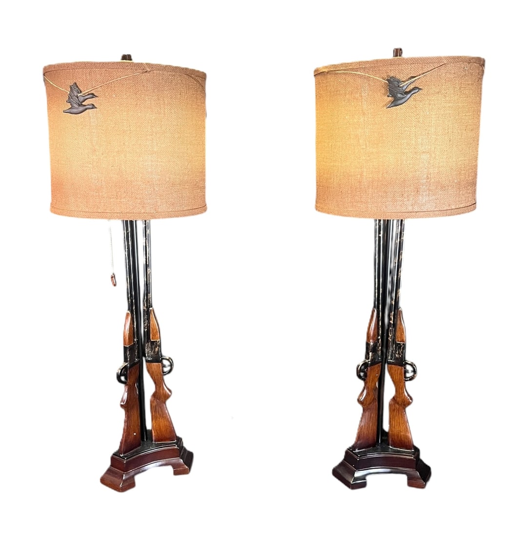 PAIR OF WOODEN GUN LAMPS WITH WOVEN SHADES: PAIR OF WOODEN GUN LAMPS WITH WOVEN SHADES. Height: 36 in. by Width: 10 in. by Depth: 10 in.