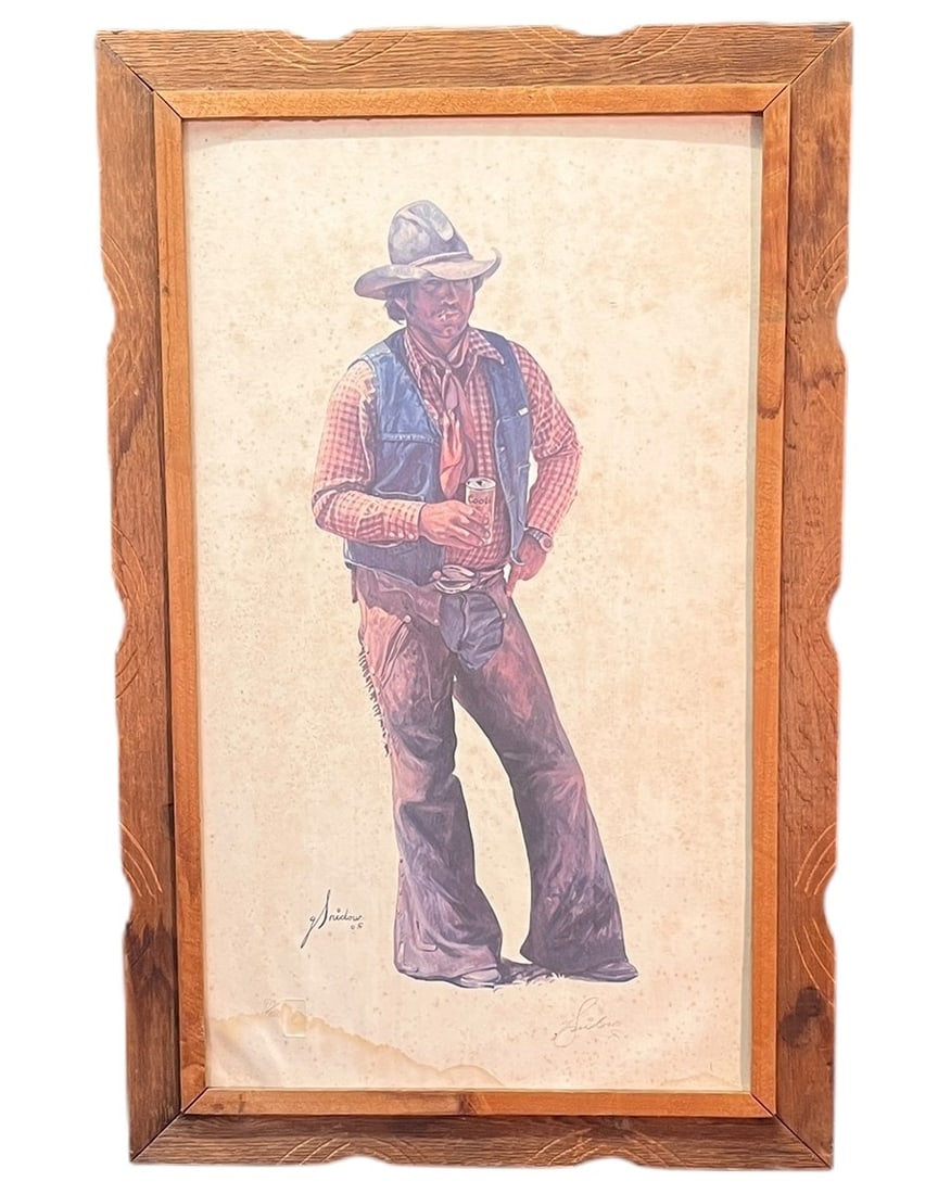 COWBOY/COORS LITHOGRAPH 679/1500 SIGNED BY SHIDOW: COWBOY AND COORS LITHOGRAPH 679/1500 SIGNED BY SHIDOW IN WOODEN FRAME Height: 35 in. by Width: 22 in. by Depth: 2 in.