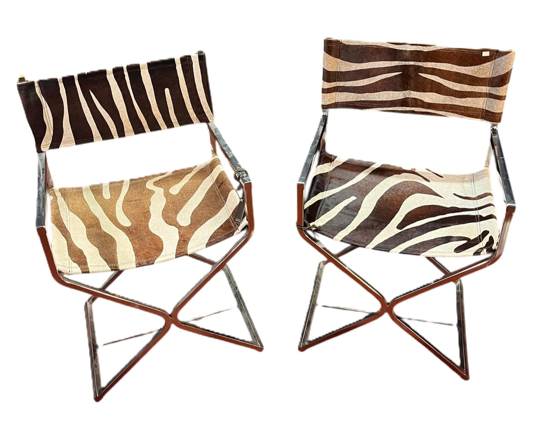 PAIR OF CHROME AND ZEBRA PRINTED COWHIDE CHAIRS: PAIR OF CHROME AND ZEBRA PRINTED COWHIDE CHAIRS. Height: 32 in. by Width: 19.5 in. by Depth: 17 in.