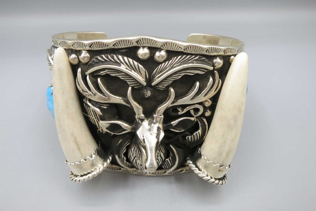 AMERICAN INDIAN SANTA FE CUFF BRACELET: AMERICAN INDIAN SANTA FE STERLING SILVER TURQUOISE & BONE CUFF BRACELET. Height: 2 1/4 in. by Width: 3 & 2 9/16 in. by Depth: 2 & 1 13/16 in.