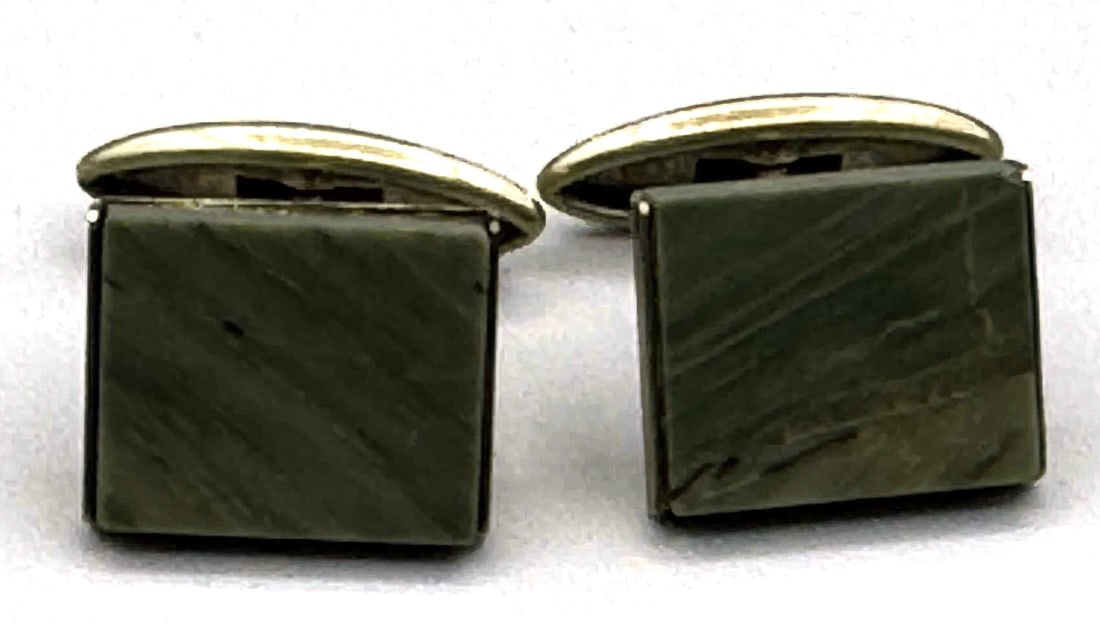 GREEN NEPHRITE 10KT GOLD PLATED CUFF LINKS: PAIR OF GREEN NEPHRITE 10KT GOLD PLATED CUFF LINKS, ENGRAVED 72.7. 11.3 GRAMS. Height: 5/8 in. by Width: 1/2 in. by Depth: 1/8 in.