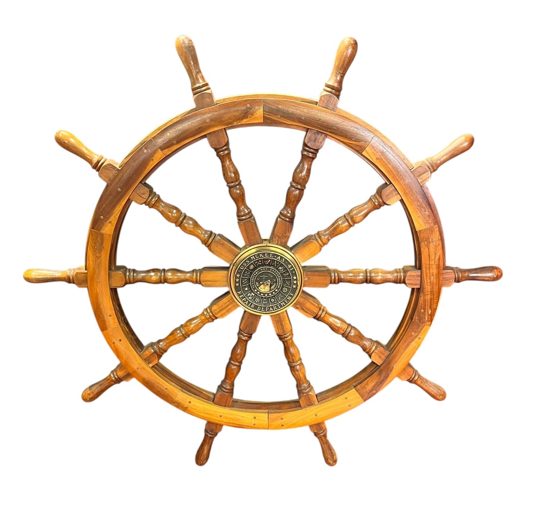 USS MCKEE WOODEN AND BRASS SHIP WHEEL: USS MCKEE WOODEN AND BRASS SHIP WHEEL Height: 49 in. by Width: 49 in. by Depth: 2.5 in.