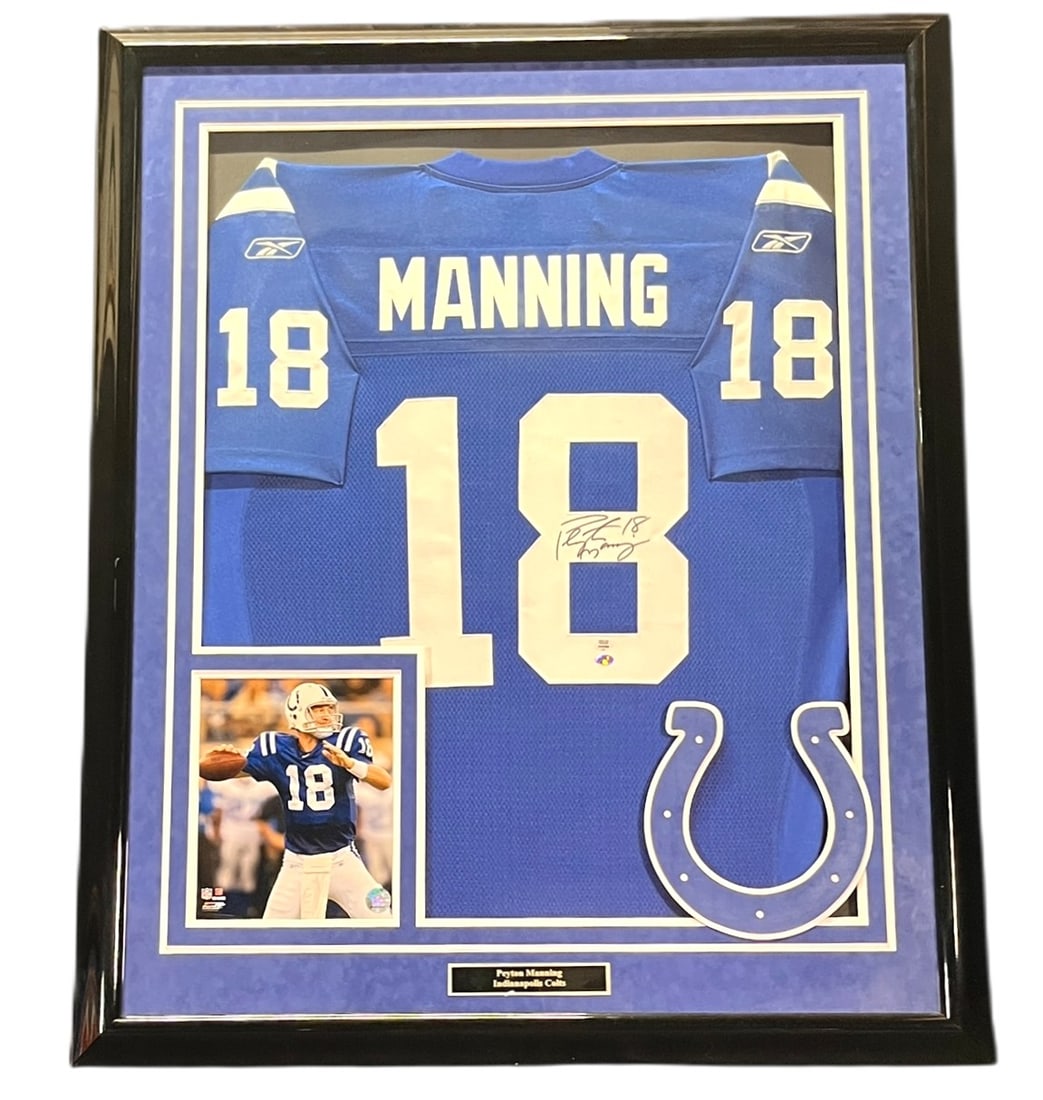 PEYTON MANNING COLTS AUTOGRAPHED JERSEY FRAMED: PEYTON MANNING COLTS AUTOGRAPHED JERSEY FRAMED Height: 43.5 in. by Width: 35.5 in. by Depth: 2 in.