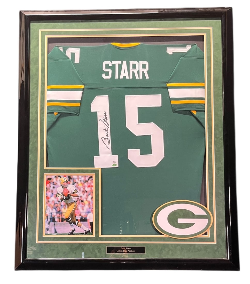 BART STARR AUTOGRAPHED JERSEY FRAMED: BART STARR AUTOGRAPHED JERSEY FRAMED Height: 43.5 in. by Width: 35.5 in. by Depth: 2 in.