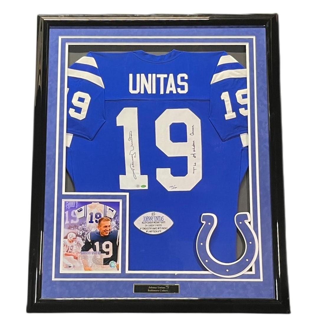 JOHNNY UNITAS COLTS FRAMED JERSERY/SIGNATURE: JOHNNY UNITAS COLTS FRAMED JERSERY/SIGNATURE Height: 43.5 in. by Width: 35.5 in. by Depth: 2 in.