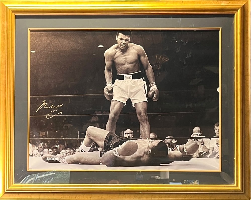 MUHAMMAD ALI SIGNED B/W PHOTOGRAPH FRAMED: MUHAMMAD ALI SIGNED B/W PHOTOGRAPH FRAMED Height: 42.5 in. by Width: 52 in.