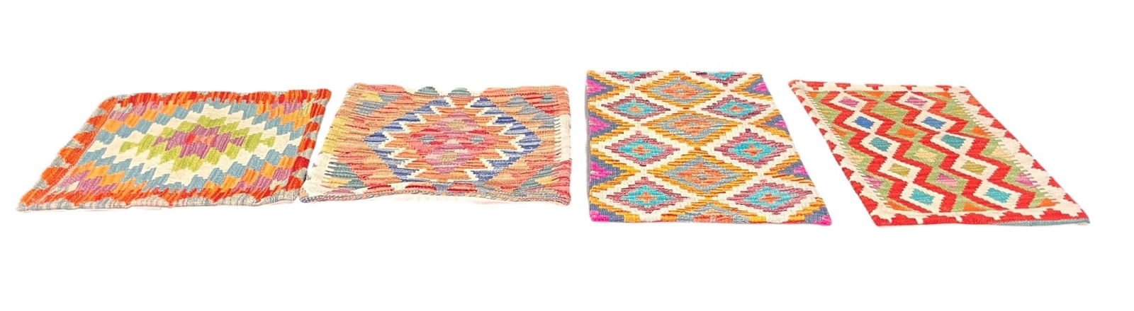 FOUR KILIM HAND WOVEN PILLOW COVERS: FOUR KILIM HAND WOVEN PILLOW COVERS.Two different sizes Height: 20 in. by Width: 9.5 IN.
