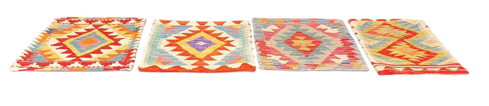FOUR KILIM HAND WOVEN PILLOW COVERS: FOUR KILIM HAND WOVEN PILLOW COVERS. Height: 20 in. by Width: 9.5 in.