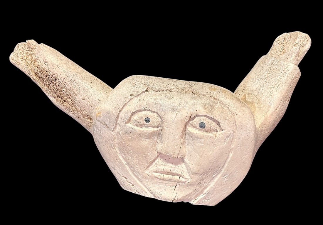 ESKIMO ART BONE CARVED FACE: ESKIMO ART BONE CARVED FACE. Height: 14 in. by Width: 22 in.