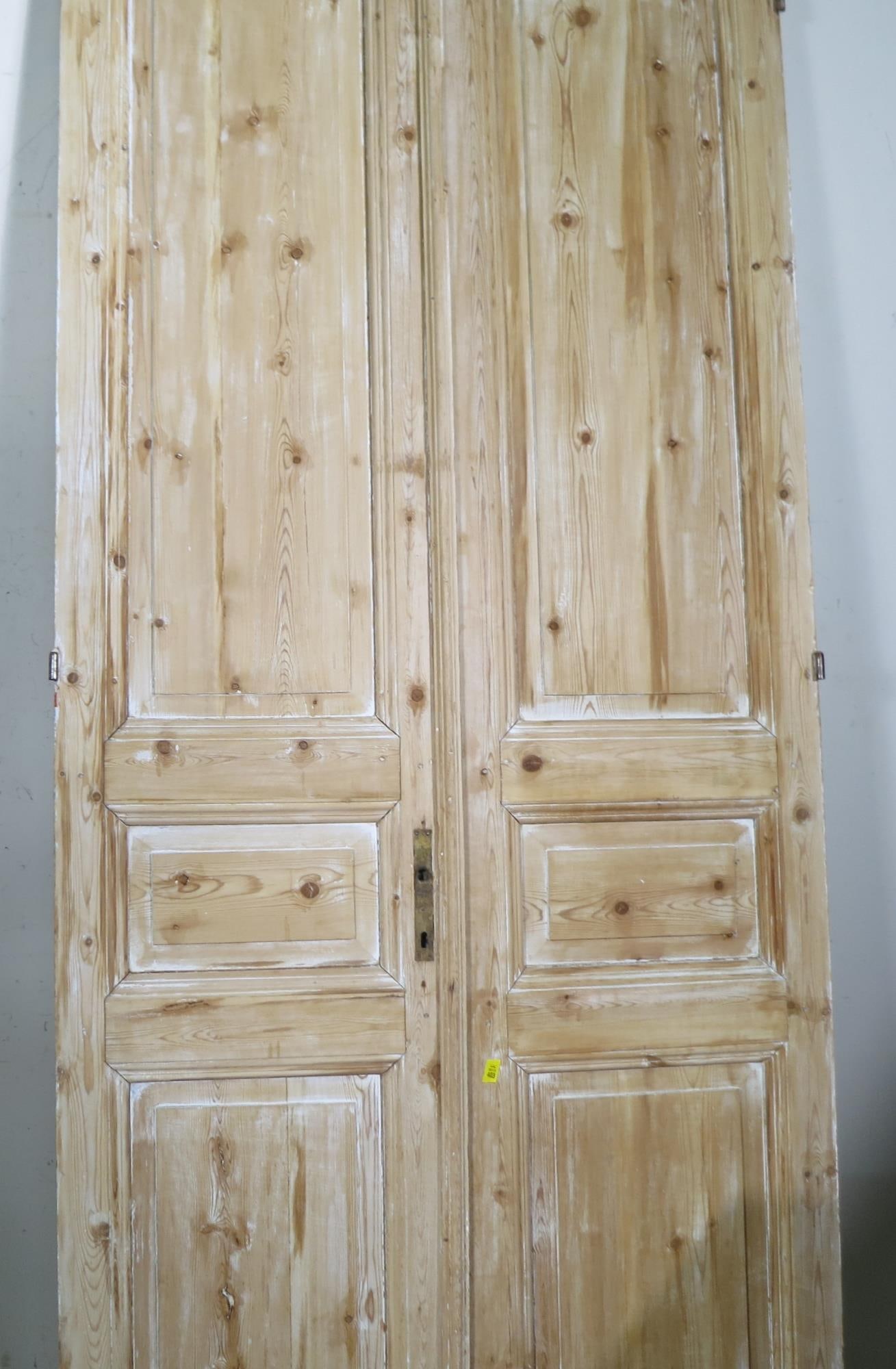 PAIR OF ANTIQUE DOORS: PAIR OF ANTIQUE DOORS. Height: 98 in. by Width: 43 in. by Depth: 2 in.