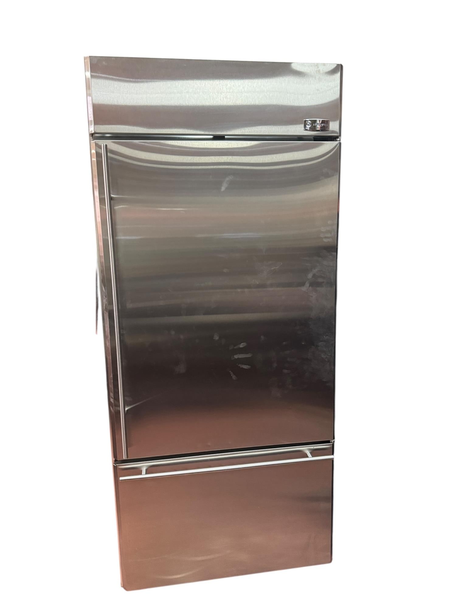 G. E. MONOGRAM STAINLESS STEEL REFRIGERATOR.: G. E. MONOGRAM STAINLESS STEEL REFRIGERATOR. Height: 84 in. by Width: 36 in. by Depth: 28 IN.